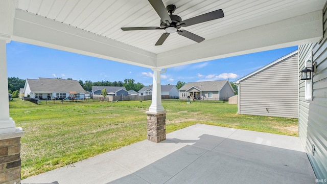 view of patio featuring ceiling fan