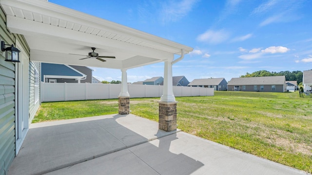 view of patio featuring ceiling fan