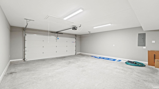 garage with a garage door opener and electric panel