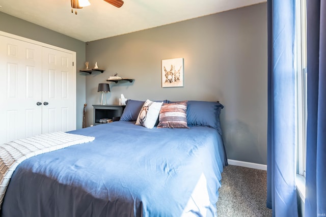 bedroom featuring a closet, ceiling fan, and carpet