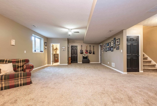 interior space with carpet flooring and a textured ceiling