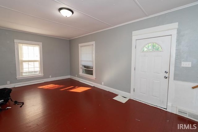 entrance foyer with a baseboard radiator, ornamental molding, and hardwood / wood-style flooring