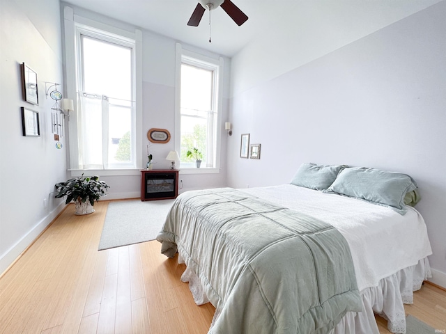 235 N Main St, Kokomo, IN 46901 - bedroom featuring light wood-type flooring, baseboards, and ceiling fan