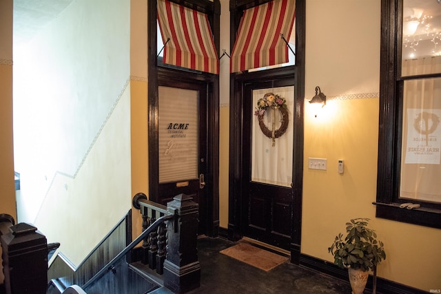 235 N Main St, Kokomo, IN 46901 - entrance foyer with concrete floors and baseboards