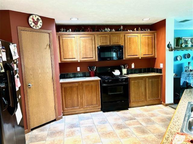 kitchen with black appliances