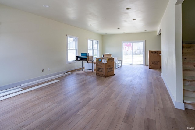 unfurnished office featuring light wood-type flooring