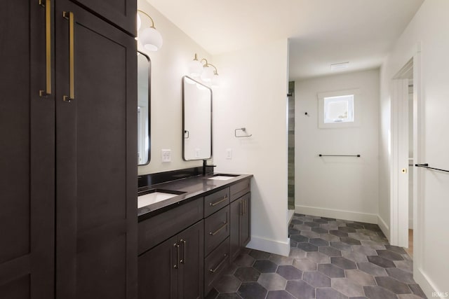 bathroom featuring vanity and walk in shower