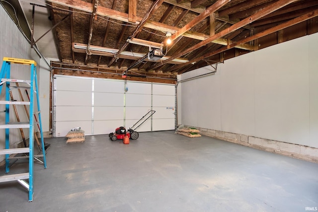 garage featuring a garage door opener