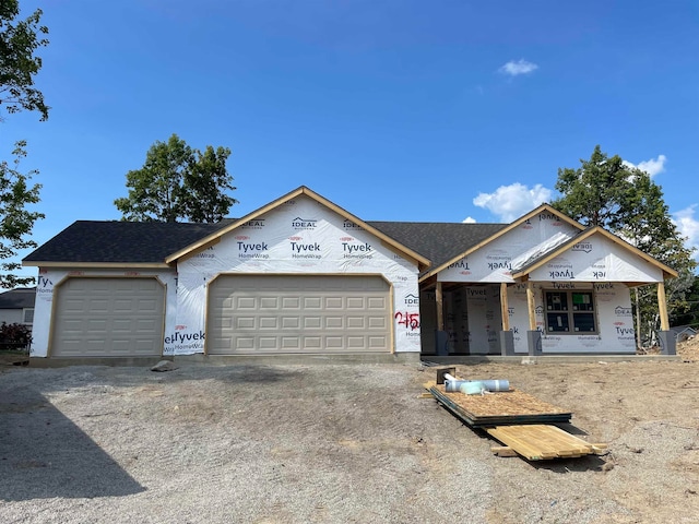 property under construction with a garage