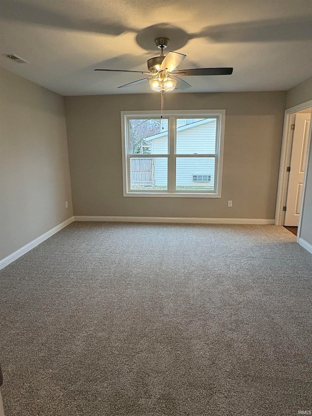 unfurnished room with carpet floors and ceiling fan