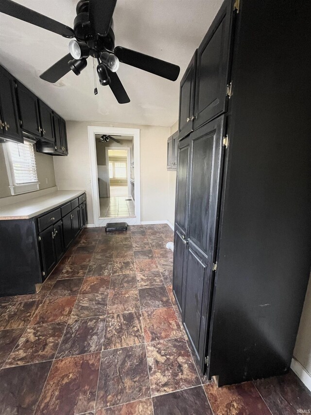 bonus room with lofted ceiling with skylight and carpet