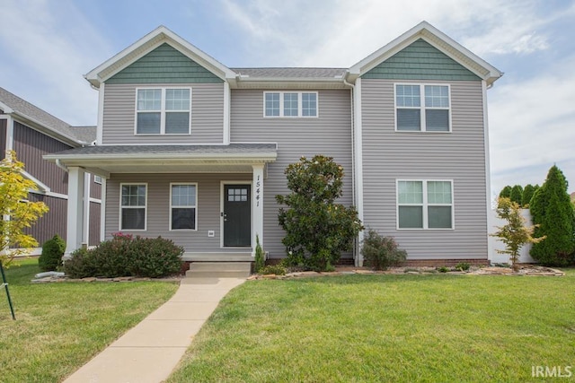 view of front of property with a front lawn