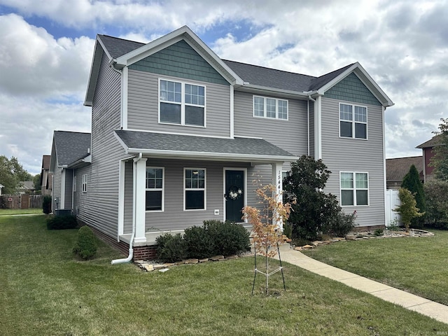 view of front of home featuring a front lawn
