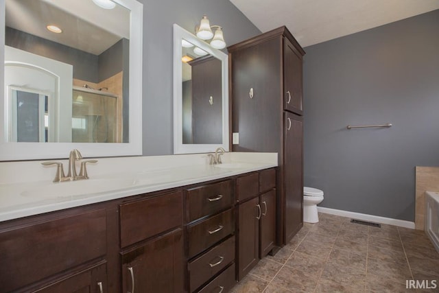 full bathroom featuring shower with separate bathtub, vanity, toilet, and tile patterned floors