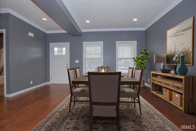 dining space featuring beamed ceiling, ornamental molding, and dark wood-type flooring