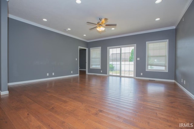 unfurnished room featuring ceiling fan, crown molding, and hardwood / wood-style flooring