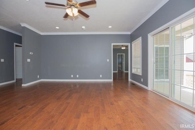 empty room featuring wood-type flooring, ceiling fan, and ornamental molding