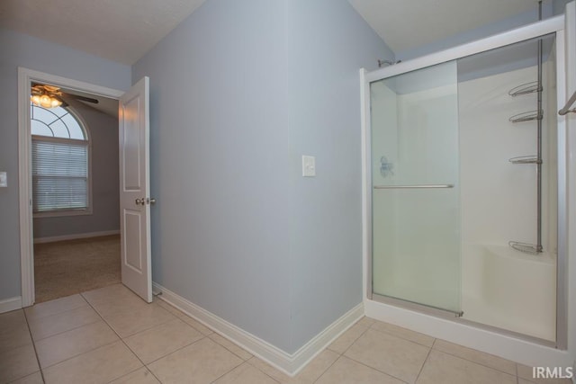 bathroom featuring tile patterned floors and walk in shower