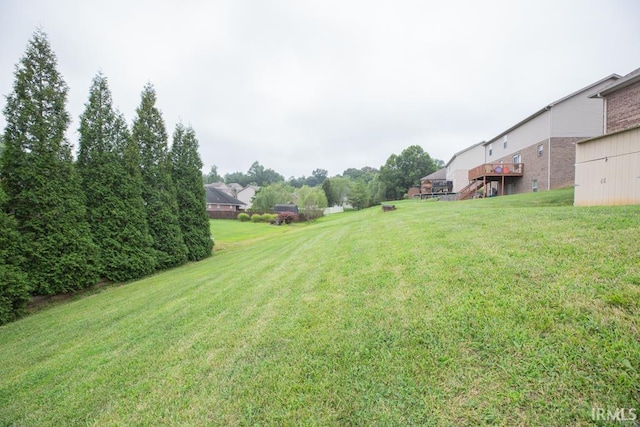 view of yard featuring a wooden deck