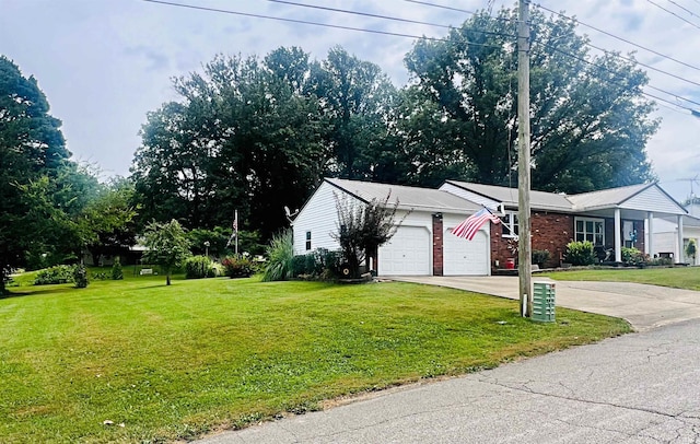 exterior space with a front yard and a garage