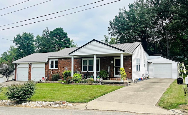 single story home featuring a front yard and covered porch