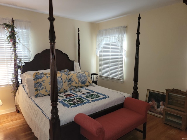 bedroom featuring wood-type flooring