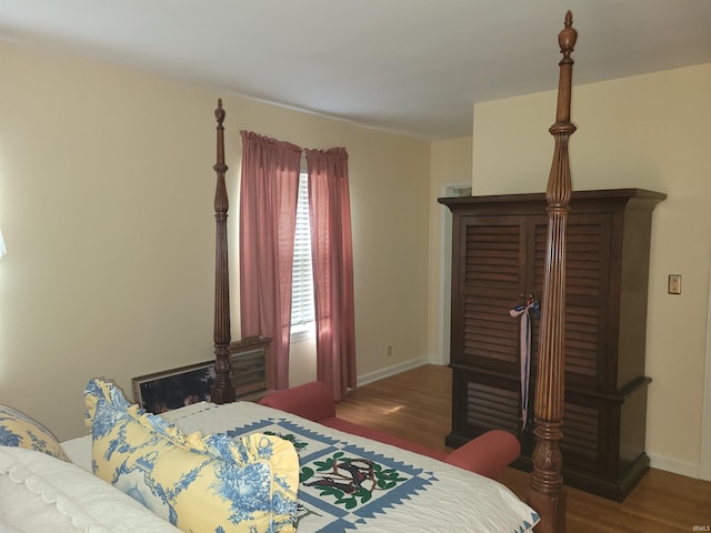 bedroom featuring dark hardwood / wood-style floors