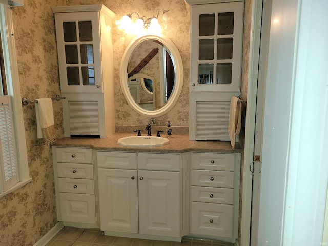 bathroom featuring tile patterned floors and vanity