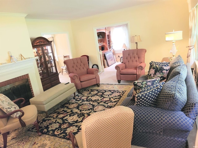 carpeted living room featuring ornamental molding and a brick fireplace