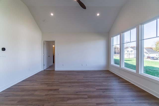 spare room with ceiling fan, high vaulted ceiling, and dark hardwood / wood-style flooring