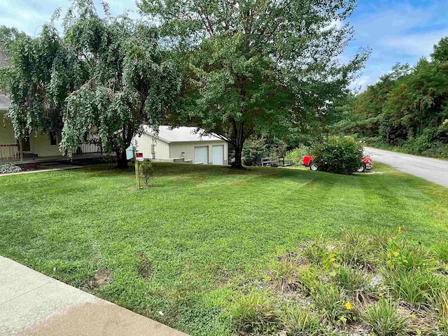 view of yard featuring a garage