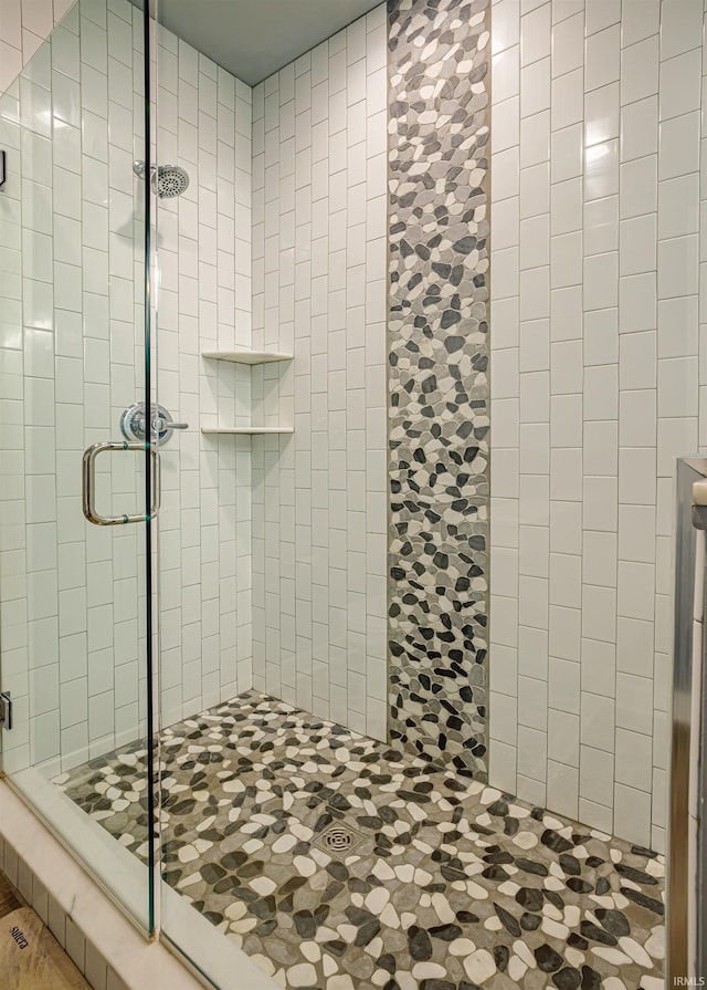 bathroom featuring an enclosed shower