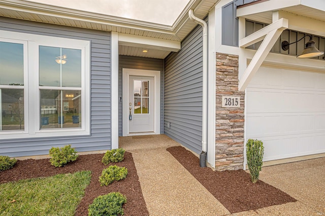 entrance to property featuring a garage