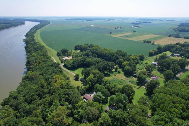 drone / aerial view featuring a water view and a rural view