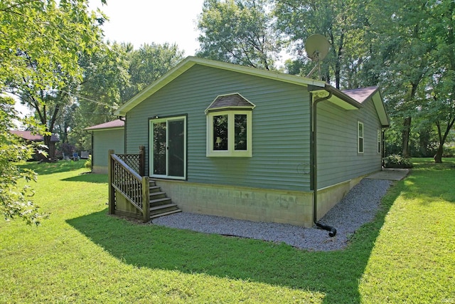 back of house with a yard