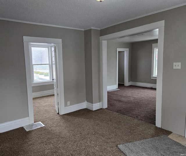 715 Osage St, Fort Wayne, IN 46808 - carpeted spare room featuring crown molding, a textured ceiling, and baseboards