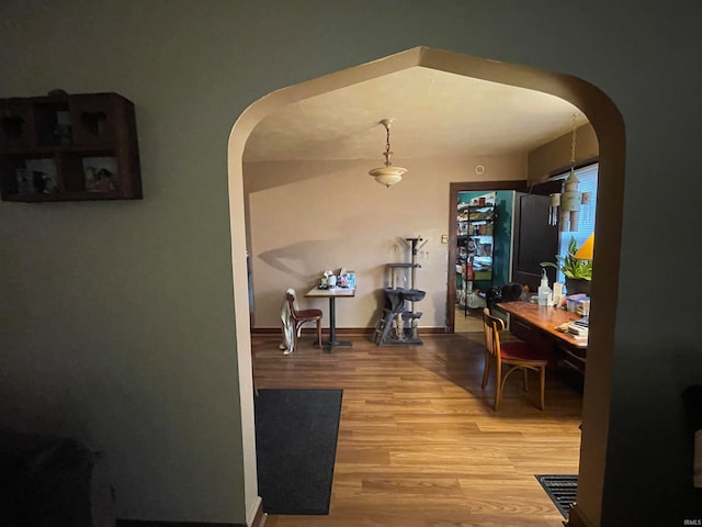 dining area with light hardwood / wood-style flooring