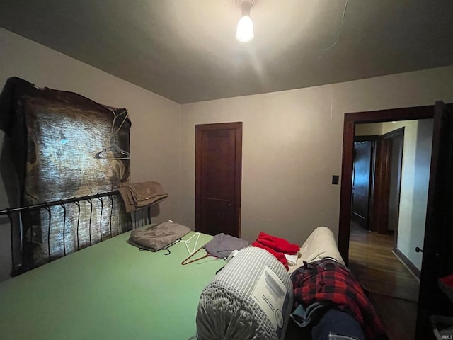 bedroom featuring hardwood / wood-style flooring