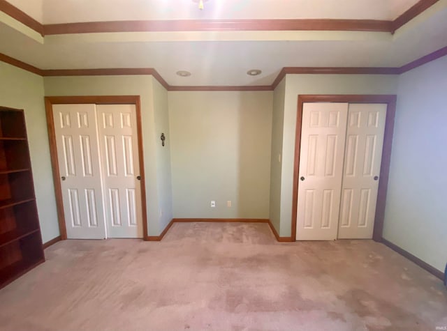 unfurnished bedroom with carpet floors and ornamental molding