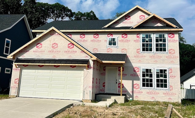 unfinished property featuring a garage