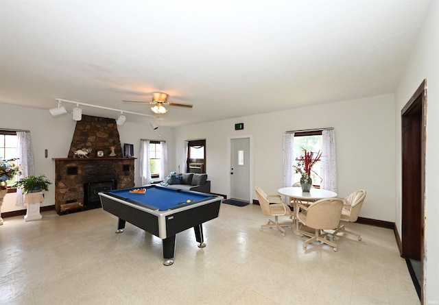 playroom featuring a wealth of natural light, rail lighting, and pool table