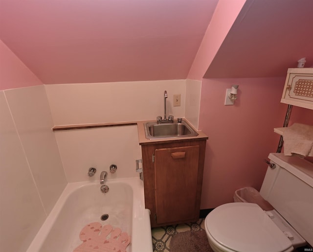 bathroom featuring sink, toilet, tile patterned floors, and a tub