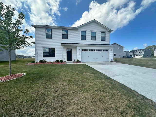 view of front of property featuring a front lawn and a garage