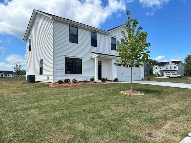 view of front of house with a garage, a front lawn, and central AC unit