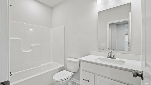 full bathroom with vanity, bathing tub / shower combination, and toilet