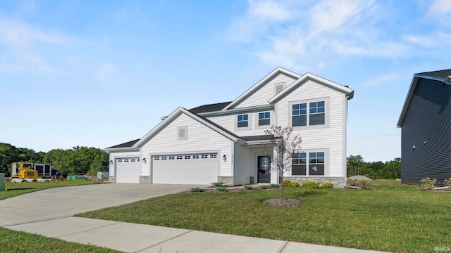 craftsman inspired home featuring a garage and a front yard