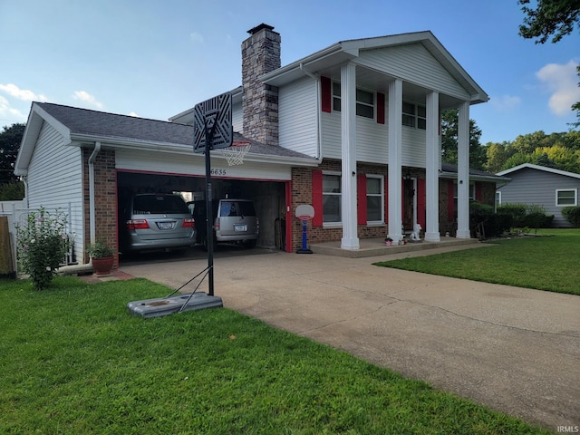 view of front of house with a garage and a front yard