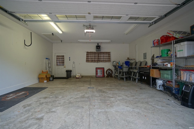 garage featuring a garage door opener