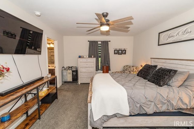 bedroom with ceiling fan, carpet, and ensuite bathroom