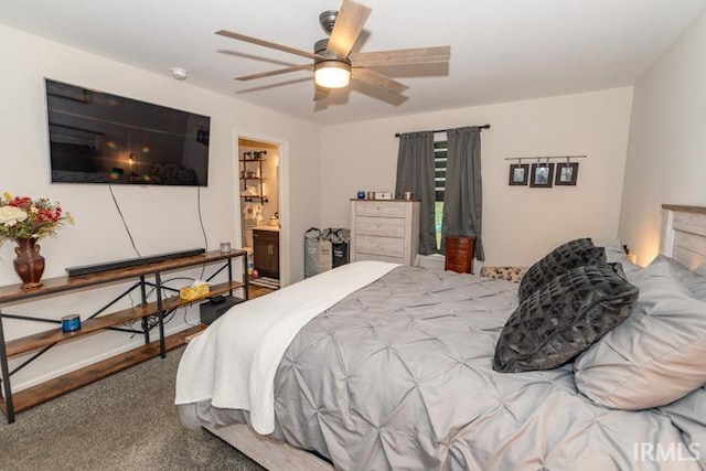 carpeted bedroom with ceiling fan and ensuite bathroom